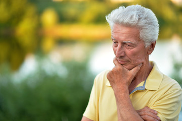 Portrait of a confident senior man outdoors