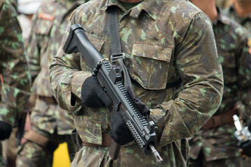 Detail of army soldier gun