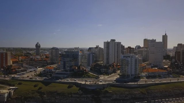 Playa Varese on the coast of Mar del Plata Argentina – 4k drone video of the Argentinian coast Mar del Plata Casino Central in spring.  Buenos Aires Capital Federal district  
