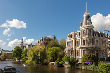 Fototapeta na wymiar House on a canal in Amsterdam