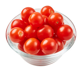 Fresh ripe tomatoes in glass bowl isolated on white background. Ingredients for cooking. Top view.