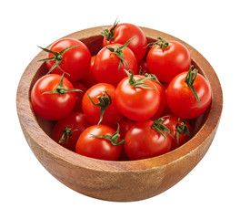 Fresh ripe tomatoes in wood bowl isolated on white background with green leaf. Ingredients for cooking. Top view.