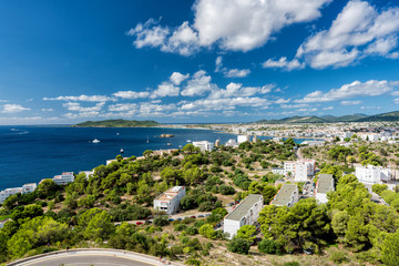 Wide angle view of Eivissa and Playa d'en Bossa Beach , Spain. High angle view with boats on the ocean
