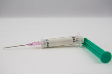 syringe with euro money