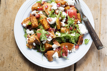 Apples, rocket, goats cheese, pomegranate salad with balsamic dressing