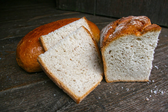 a piece of tasty country bread photo