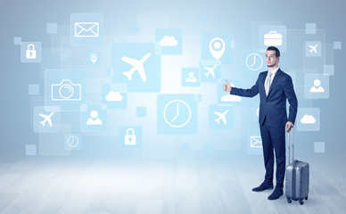 Businessman departs to a business trip with social media and travel symbol concept
