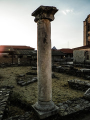 Old columns and ruins in Plaoshnik area, Ochrid, Macedonia.
