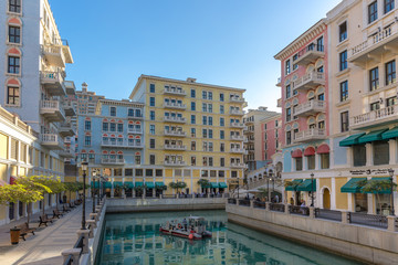 The canals of Venice like Qanat Quartier at the Pearl in Doha, Qatar in a late afternoon.