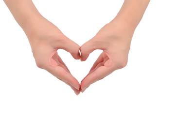 Obraz premium Close up of heart made by women hands with pale skin isolated on over white background