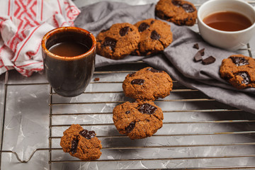 Breakfast cookies with chocolate and cocoa, gray background. Clean eating concept.