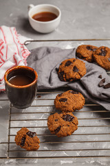 Breakfast cookies with chocolate and cocoa, gray background. Clean eating concept.