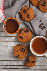 Breakfast cookies with chocolate and cocoa, gray background. Clean eating concept.