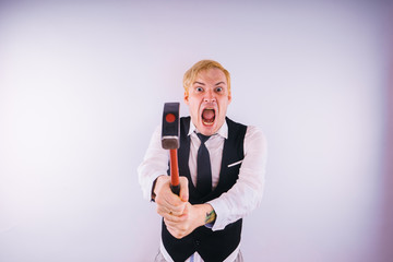 emotional portrait of a crazy guy in close-up. concept: the nervous breakdown, mental disease, headaches and migraine. 