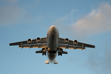 City Airport plane landing in the evening with tourists 