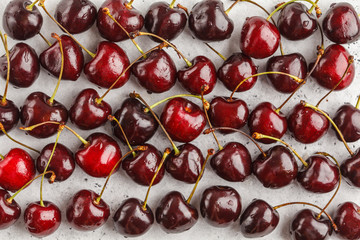 Fresh raw cherry background, top view.