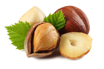 hazelnuts with leaves isolated on white background. macro