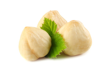 hazelnuts with leaves isolated on white background. macro