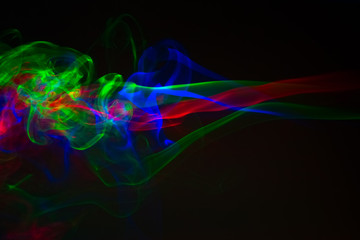 Colorful abstract smoke pattern on black background