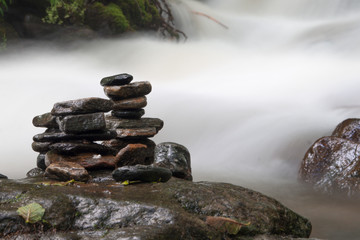 ZEN BALANCING ROCKS NEAR RIVER