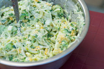 Cabbage salad with corn and cucumbers. Tasty and healthy.