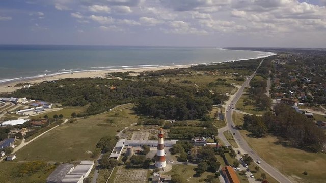 Mar del Plata Lighthouse Argentina – 4k drone video of the El Faro Lighthouse Argentinian coast near Acantilados and downtown area of Mar del Plata in spring.  Buenos Aires Capital Federal district  