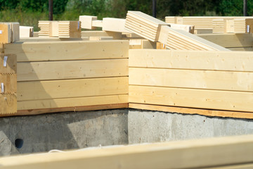 Construction of a wooden house of laminated veneer lumber.