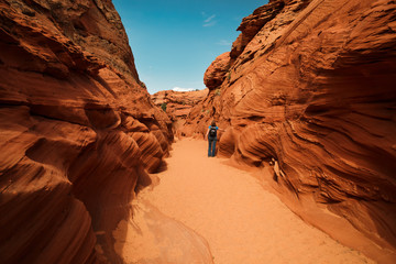 Scenic colorful canyon landscape with beautiful clouds in the sky. Beauty of American southwest. Slot canyon in Page, Arizona