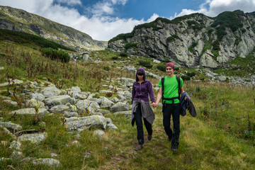 Fototapeta na wymiar Young couple of hikers