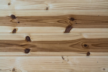 The natural color of unpainted wooden boards