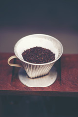 coffee bean for drip coffee process, vintage filter image
