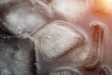 cola with ice close up