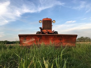 tractor with pusher blade