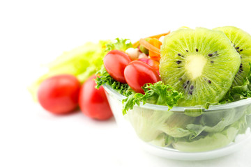 Fresh mixed vegetables salad isolated on white background..
