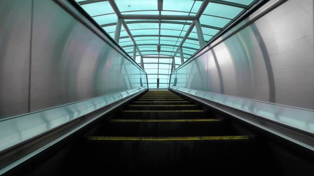 Moving escalator up, mecanic, electic. Stairs and escalators in a public area. 4K