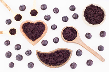 Acai powder and berries - Euterpe oleracea.