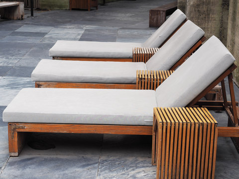 Lounge Chair Around Swimming Pool    