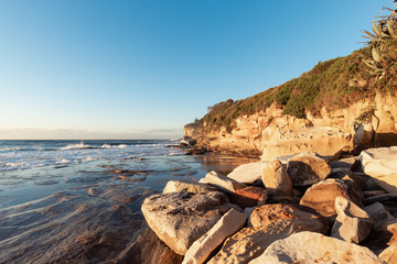 Ocean view from rocky coastline side.