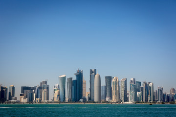 Fototapeta na wymiar The skyline of Doha in a haze winter day in Qatar