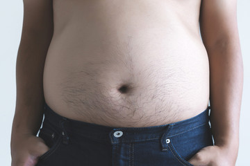 Naklejka premium man with overweight big fat belly chubby