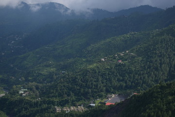 Fototapeta na wymiar mountain landscape with cloud sky and valley natural forest in monsoon season