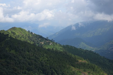 Fototapeta na wymiar mountain landscape with cloud sky and valley natural forest in monsoon season