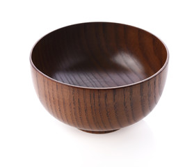 Wooden bowl on white background