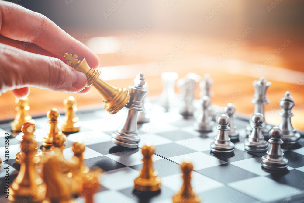 Wall mural Businessman playing chess Plan of leading strategy successful business leader concept