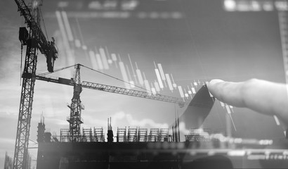 Investment in real estate business. Double exposure,  finger pointing on decreasing graph and...