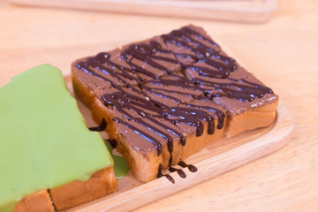 Toast with jam chocolate  on wooden tray