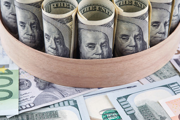 Rolls made of american dollars banknotes