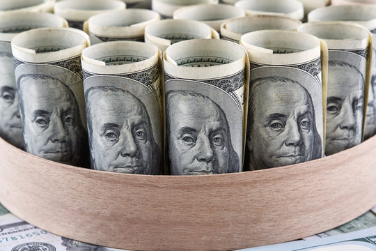 Rolls made of american dollars banknotes