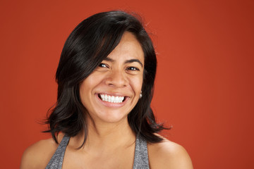 Happy smiling latina young woman portrait