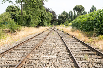 Fototapeta premium two tracks next to the station